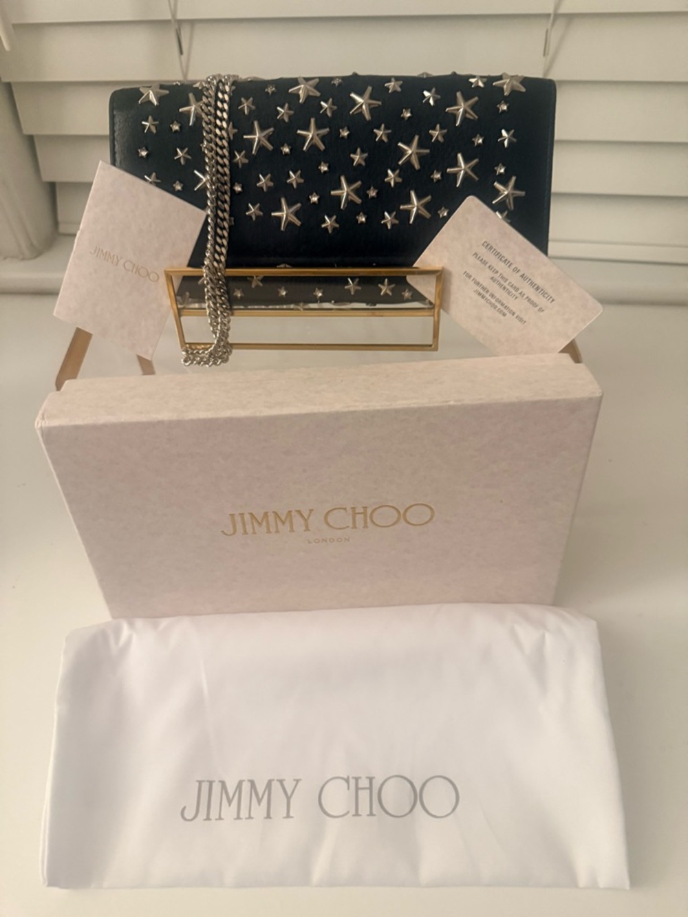 . Jimmy Choo: Milla Black Star-Studded Leather Chain Clutch Wallet - Picture 1 of 10